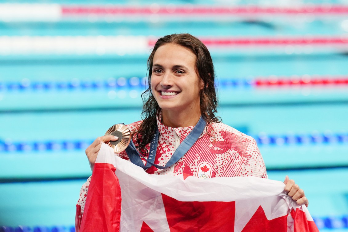 Kylie Masse poses with bronze medal