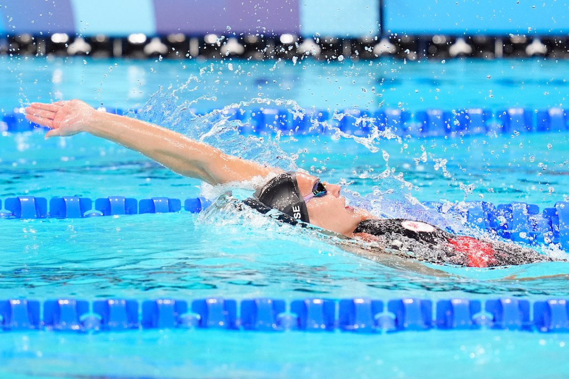 Kylie Masse swims the backstroke