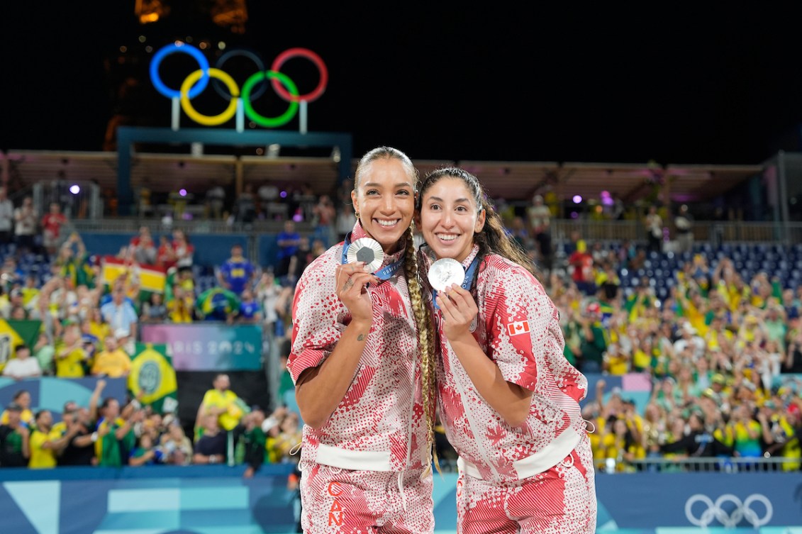 Melissa Humana-Paredes and Brandie Wilkerson show off their silver medals 