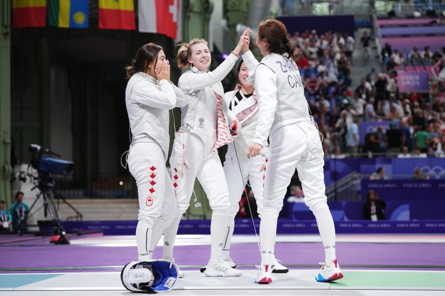 Team Canada celebrates after a win over France.