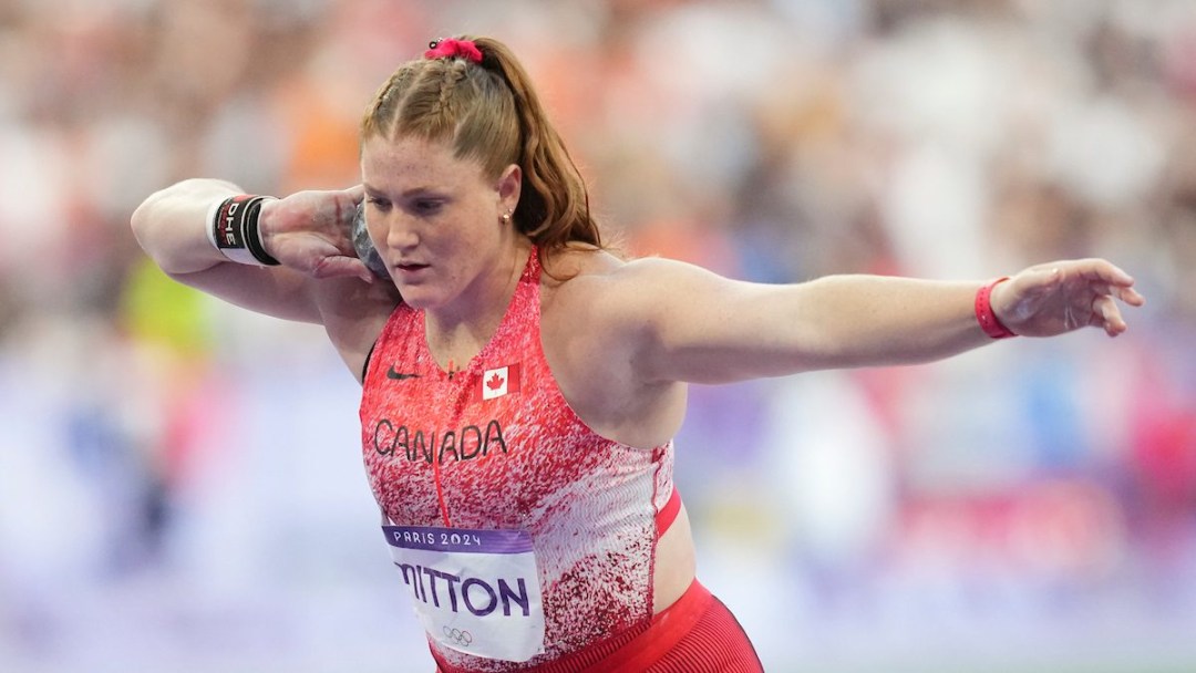 Sarah Mitton prepares to throw the shot put