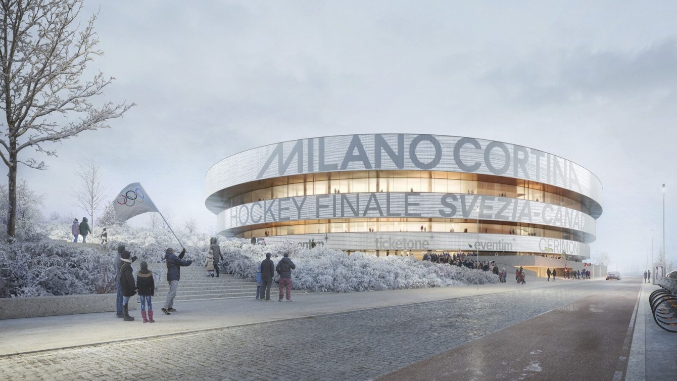 A rendering of an ice hockey arena for Milano Cortina 2026 is a silver oval stadium pictured with spectators walking outside of it