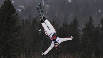 Marion Thénault is upside down in mid air