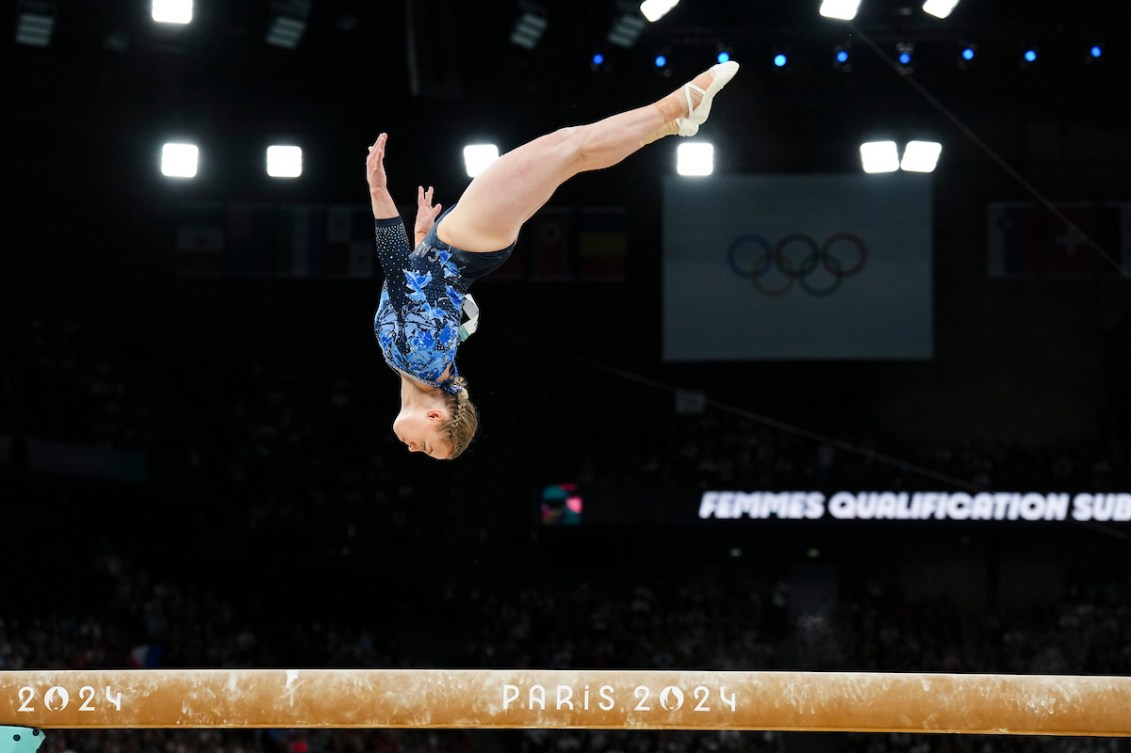 Ellie Black flips on the beam