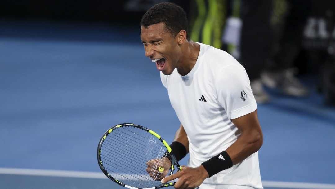 Felix Auger-Aliassime of Canada reacts after defeating Sebastian Korda of the United States in the men's final of the Adelaide International at Memorial Drive Tennis Club in Adelaide, Australia, Saturday, Jan. 11, 2025.