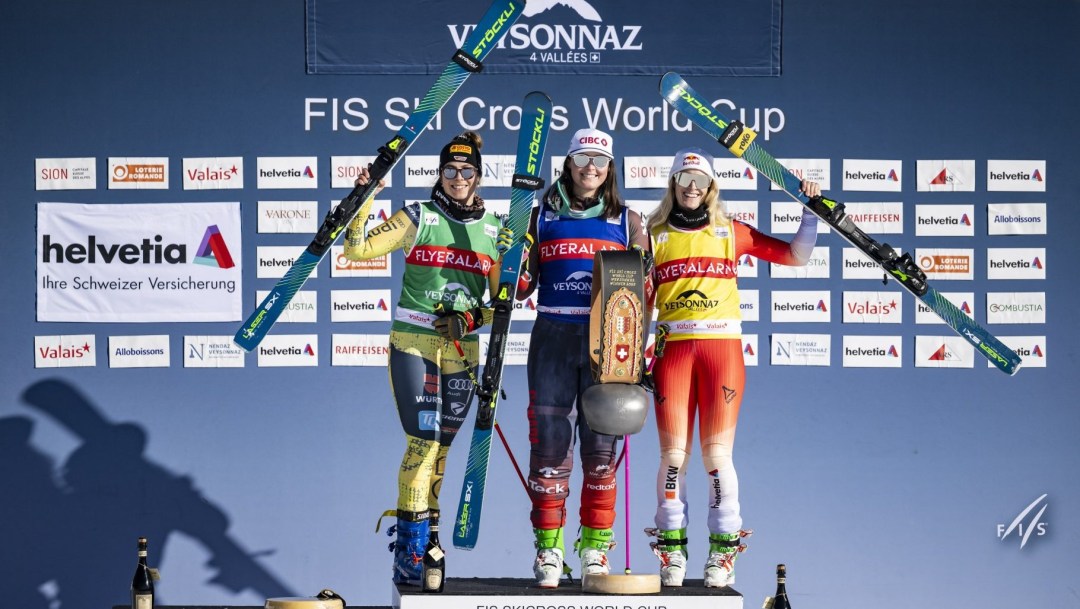 Marielle Thompson (centre) wins gold for Canada in ski cross