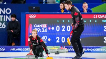 Team Canada’s Jocelyn Peterman and Brett Gallant competing.