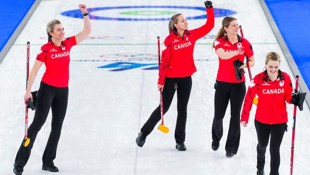 Team Canada’s Emma Miskew, Rachel Homan, Sarah Wilkes and Tracy Fleury celebrate