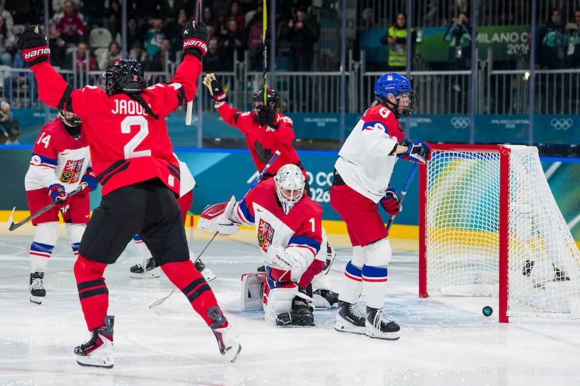 Sophie Jaques celebrates a goal by teammate Julia Gosling 