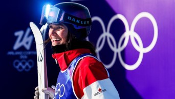 Team Canada’s Maïa Schwinghammer smiles after her run in freestyle ski moguls finals