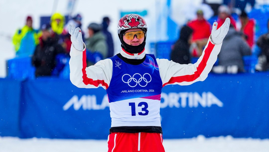 Team Canada’s Lewis Irving reacts after his jump in Men's Aerials finals