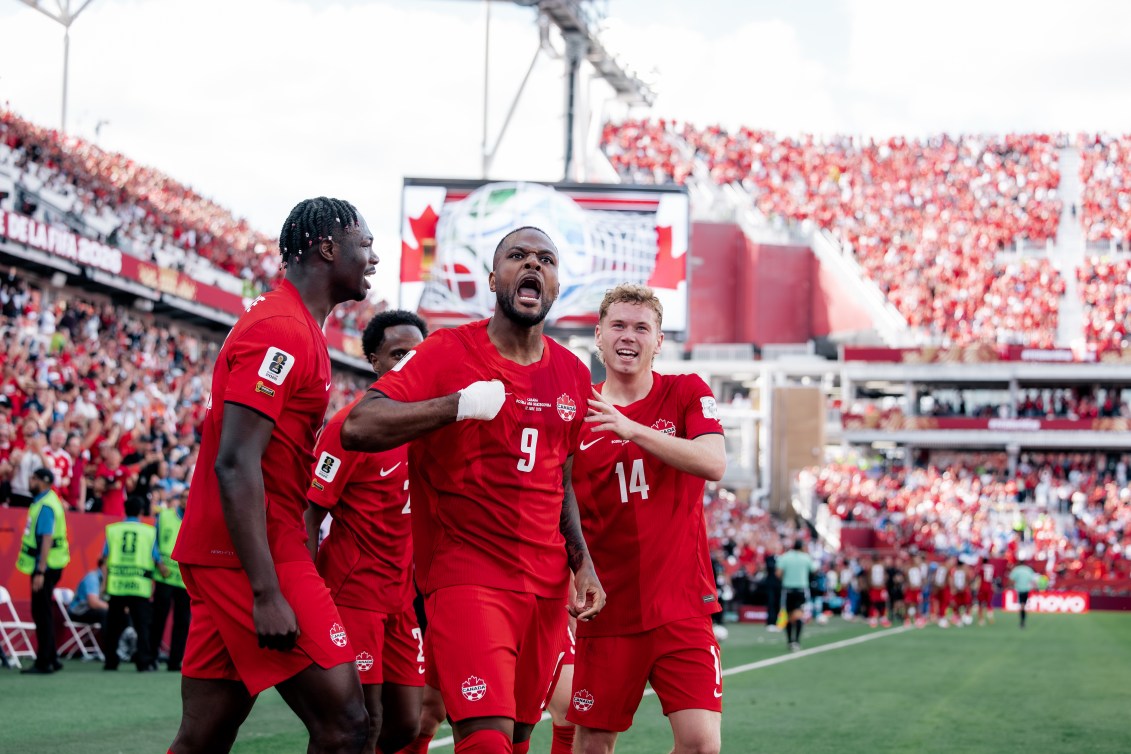Cyle Larin and teammates celebrate after his goal against Bosnia and Herzegovina on Friday