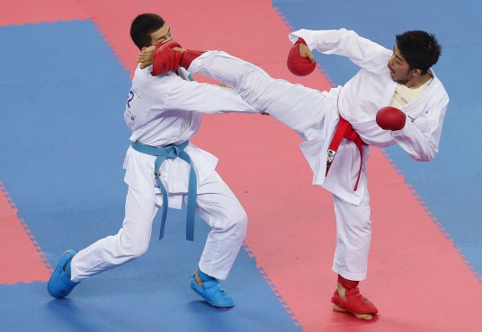 Le karaté est l’un des sports que l’on espère ajouter au programme olympique. Photo : Une compétition de karaté aux Jeux asiatiques de 2014.