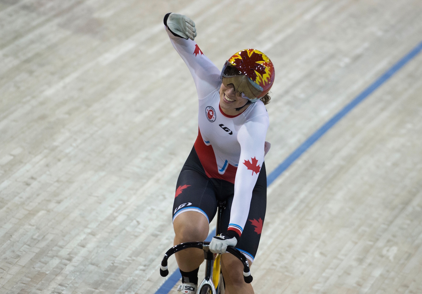 Monique Sullivan wins gold in the Women's Keirin at the Pan American Games in Toronto, July 17, 2015. COC Photo by Jason Ransom