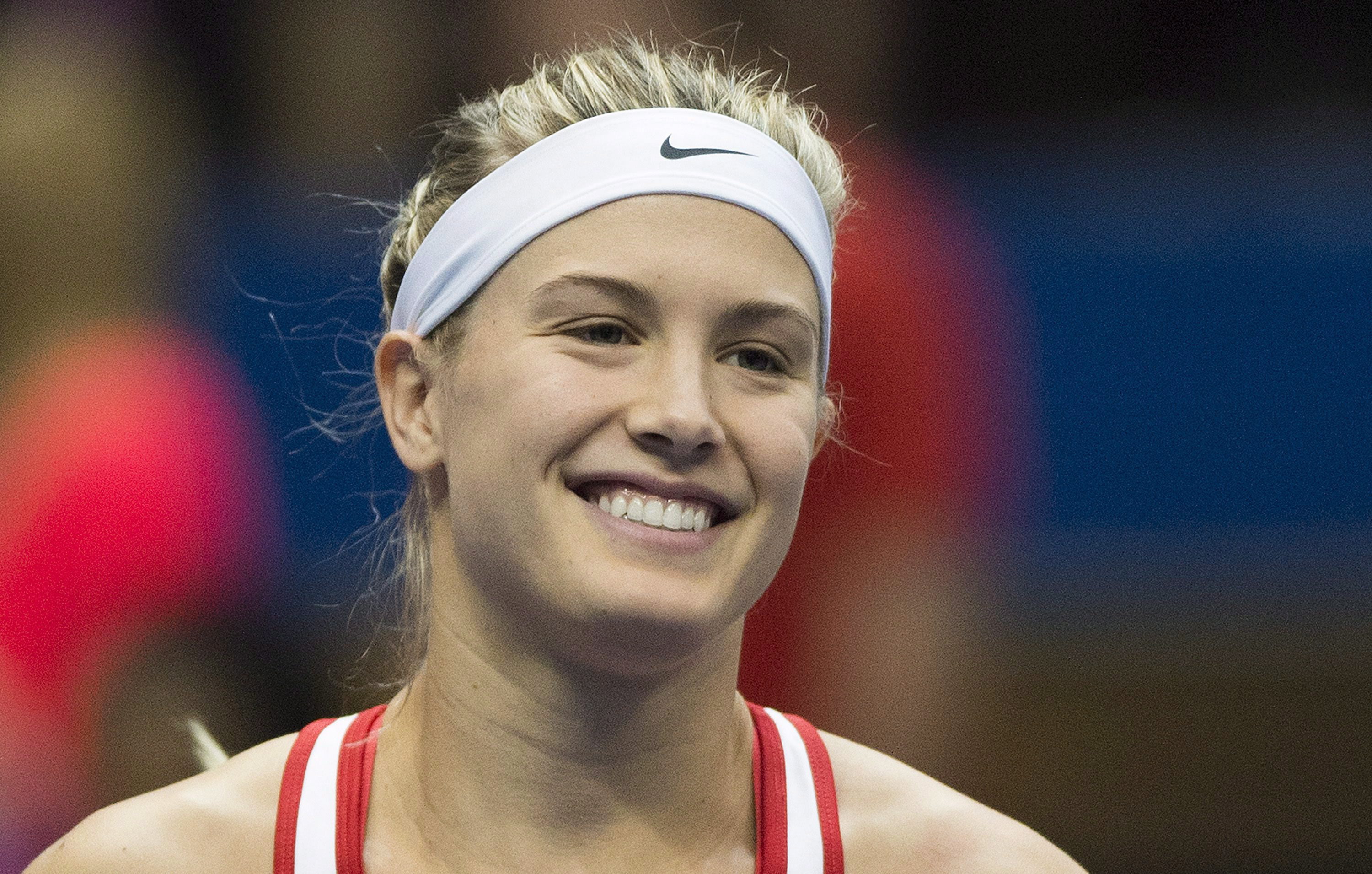 Canada's Eugenie Bouchard smiles at the start of her Federal Cup tennis match against Romania's Alexandra Dulgheru in Montreal, Saturday, April 18, 2015. THE CANADIAN PRESS/Graham Hughes