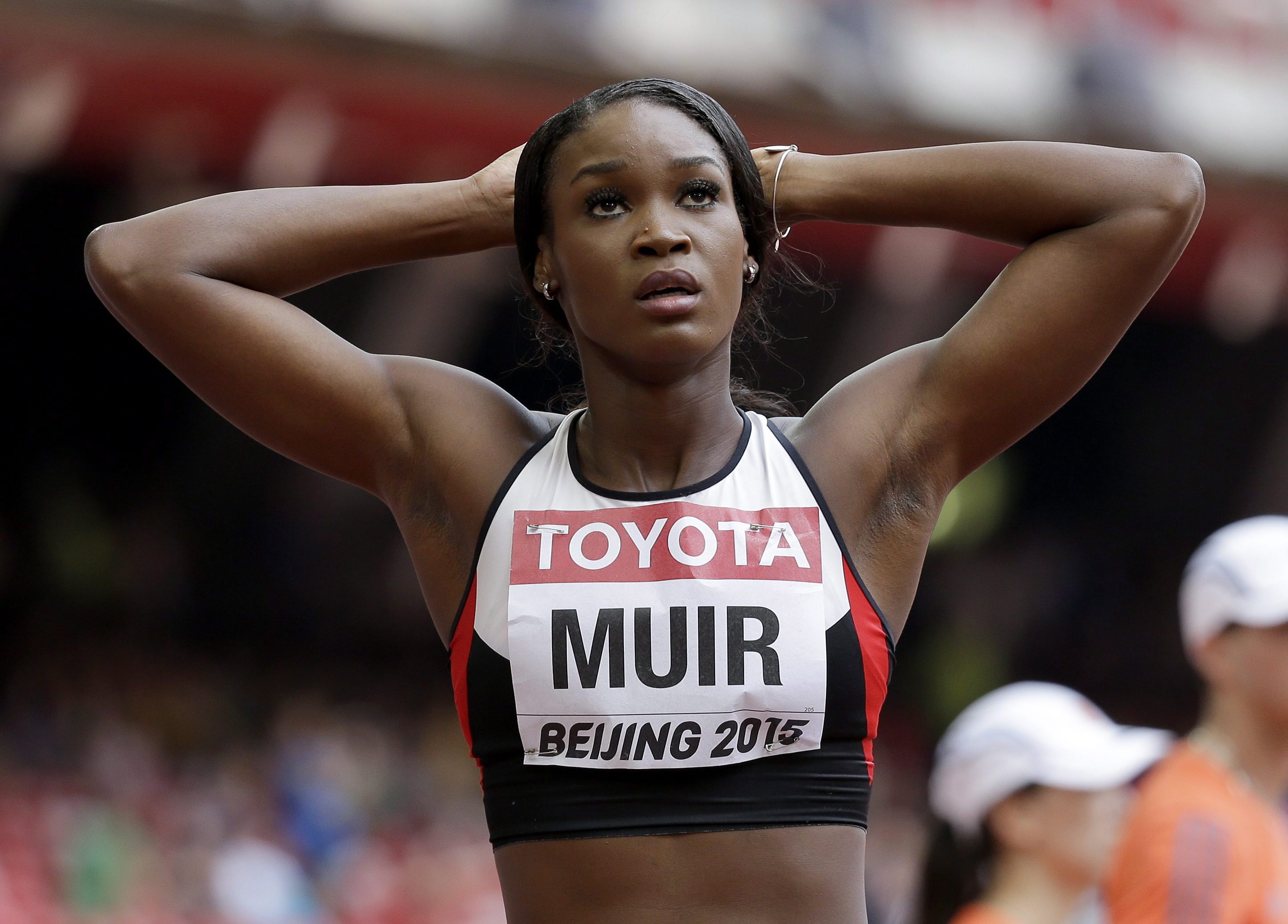 Canada's Carline Muir looks at her time following her heat of the womens 400m at the World Athletics Championships at the Bird's Nest stadium in Beijing, Monday, Aug. 24, 2015. (AP Photo/David J. Phillip)