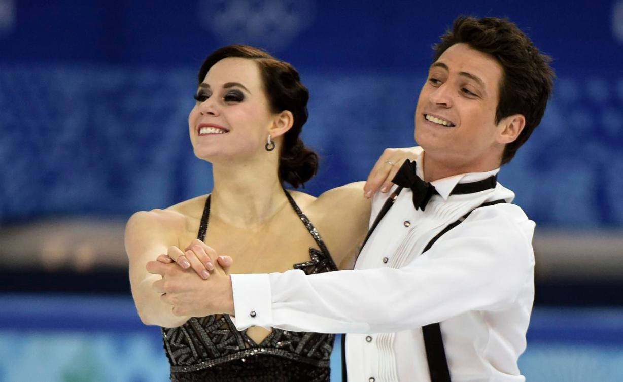 Tessa Virtue et Scott Moir lors de la danse courte aux Jeux olympiques de Sotchi, le 16 février 2014. THE CANADIAN PRESS/Paul Chiasson