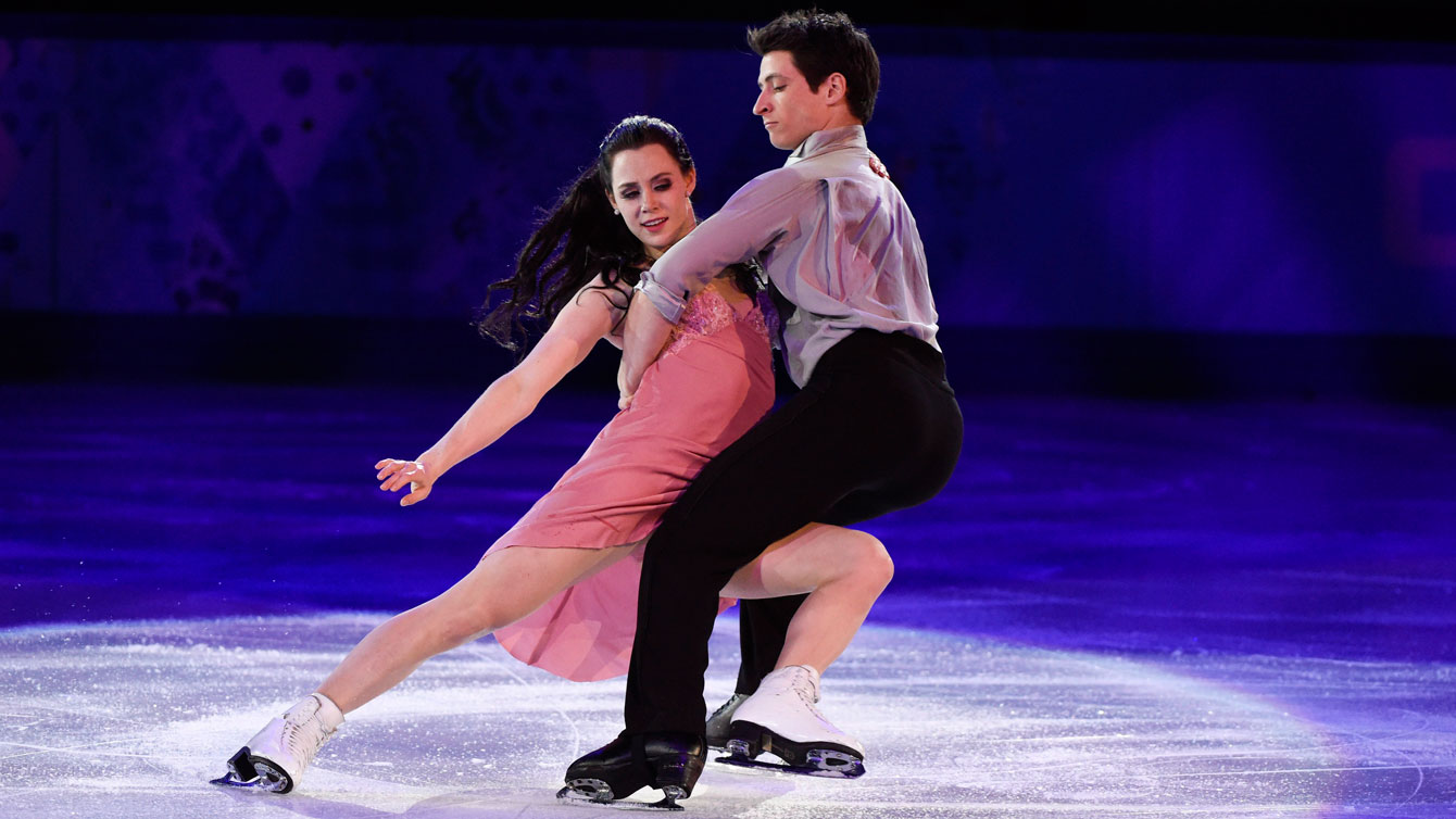 Tessa Virtue et Scott Moir lors du gala des champions aux Jeux olympiques de Sotchi, le 22 février 2014. THE CANADIAN PRESS/Paul Chiasson