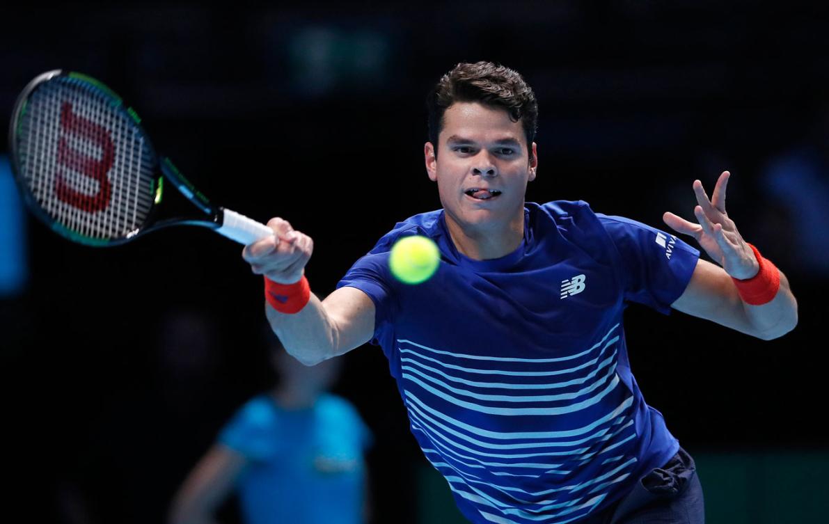 Milos Raonic contre l'Autrichien Dominic Thiem lors des Finales de l'ATP, le 17 novembre 2016 à Londres. (AP Photo/Kirsty Wigglesworth)