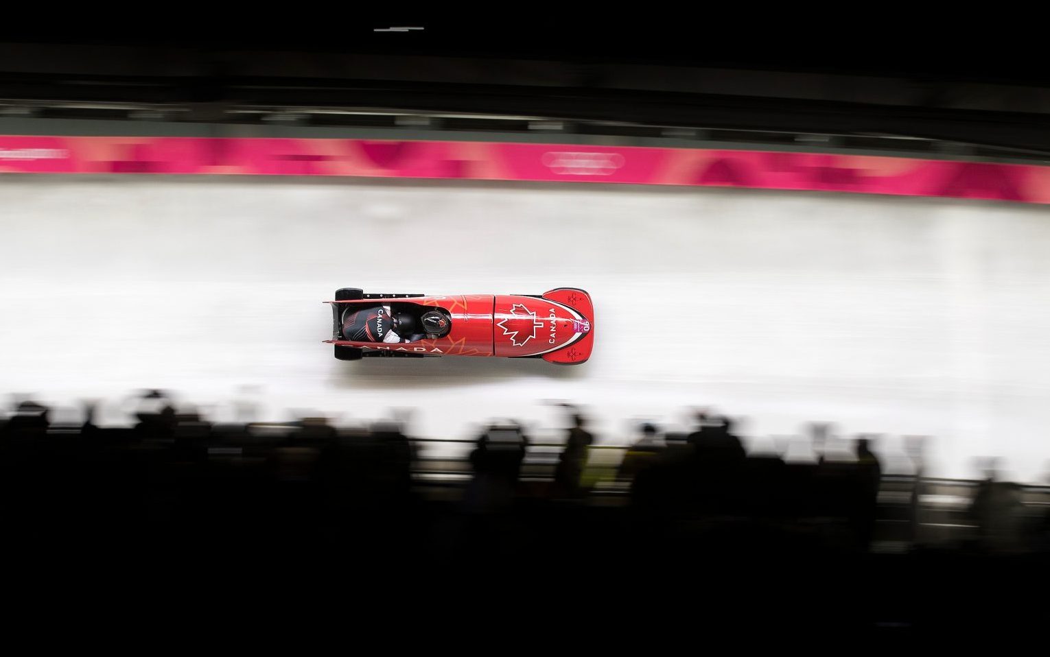 Canada’s Justin Kripps et Alex Kopacz lors de la troisième manche de l'épreuve masculine de bob à deux des Jeux olympiques de PyeongChang, le 19 février 2018.